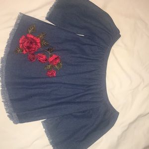 Off the shoulder, Jean shirt w/ embroidered rose.